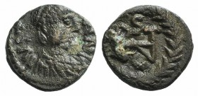 Ostrogoths, Athalaric (526-534). Æ Nummus (9mm, 0.84g, 12h). Rome, in the name of Justinian. Diademed, draped and cuirassed bust of Justinian r. R/ Mo...