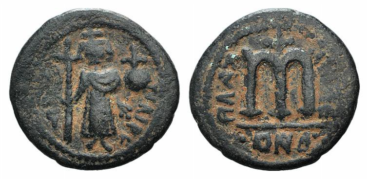 Islamic, Arab-Byzantine, c. 7th century. Æ Fals (21.5mm, 3.96g, 12h). Uncertain ...