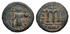 Islamic, Arab-Byzantine, c. 7th century. Æ Fals (21.5mm, 3.96g, 12h). Uncertain mint, c. 658-664. Emperor standing facing, holding long cross and glob...