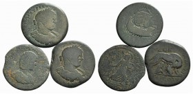 Lot of 3 Roman Provincial Æ coins, including Caracalla and Julia Domna, to be catalog. Lot sold as is, no returns
