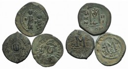 Lot of 3 Byzantine Æ coins, including Heraclius and Maurice Tiberius, to be catalog. Lot sold as it, no returns