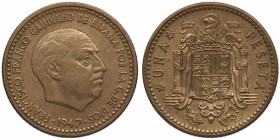 1947*49. Franco (1939-1975). 1 peseta. Cu-Ni. ESCASA. EBC-. Est.20.