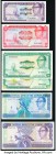 Gambia Central Bank of Gambia Group Lot of 6 Examples About Uncirculated-Crisp Uncirculated. All Crisp Uncirculated except the 5 Dalasi which is About...