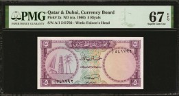 QATAR & DUBAI. Currency Board. 5 Riyals, ND (ca. 1960). P-2a. PMG Superb Gem Uncirculated 67 EPQ.
This Five Riyals note shows fully original paper an...