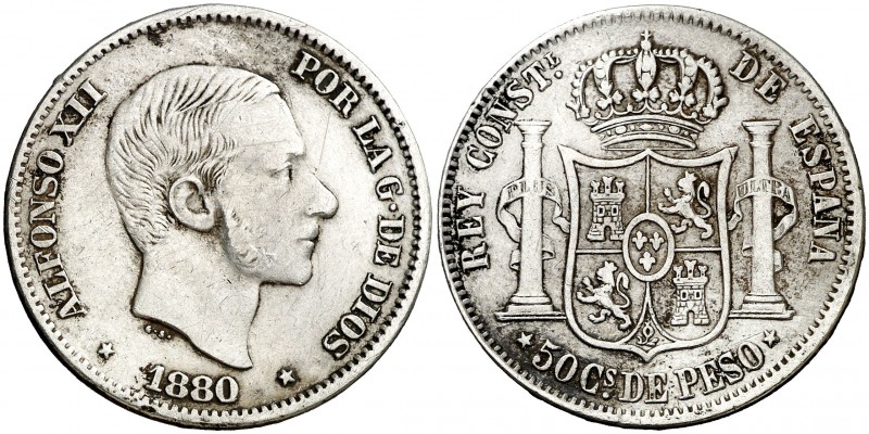 1880. Alfonso XII. Manila. 50 centavos. (AC. 112). 12,89 g. Rara. MBC-/MBC.