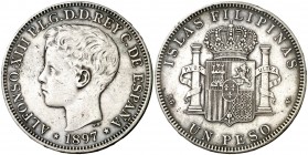 1897. Alfonso XIII. Manila. SGV. 1 peso. (AC. 122). 24,80 g. Leves golpecitos. MBC.