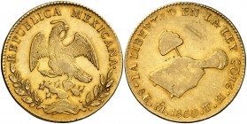 1860. México. México. TH. 8 reales. (Cal.Onza 2036) (Fr. 64) (Kr. 383.9). 26,99 g. AU. Rayitas. Parte de brillo original. MBC+/MBC.