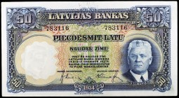 1934. Letonia. Banco de Letonia. 50 latu. (Pick 20a). Primer ministro K. Ulmanis. Leve doblez. Escaso. EBC+.