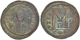 THE BYZANTINE EMPIRE
JUSTINIANUS I, 527-565
Mint of Constantinopolis
Ae-Follis year XII (538/539). Officina Γ. Sear 163. DOC 37c. MIB 95. 21.95 g. ...