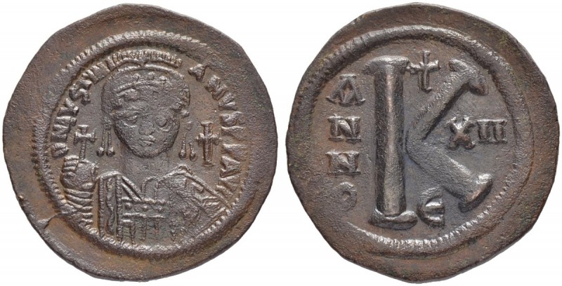 THE BYZANTINE EMPIRE
JUSTINIANUS I, 527-565
Mint of Constantinopolis
Ae-half ...