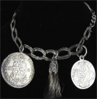 Münzgefässe und Münzschmuck
Trachtenkette Silber mit Gamsbart und 2 Münzen: Bayern 30 Kreuzer 1724 und 1/2 Madonnentaler 1705 der ungarischen Malkonte...