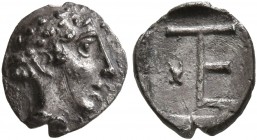 IONIA. Kolophon. Circa 450-410 BC. Tetartemorion (Silver, 7 mm, 0.31 g, 12 h), Persic standard. Laureate head of Apollo to right. Rev. Monogram of TE;...