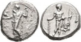 CILICIA. Issos. Circa 385-380 BC. Stater (Silver, 21 mm, 10.60 g, 10 h). Ba'al standing front, head to left, holding eagle in his right hand and scept...