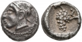 CILICIA. Soloi. Circa 440-410 BC. Obol (Silver, 8 mm, 0.84 g, 3 h). Head of Amazon to left, wearing pointed cap with curved wing. Rev. Σ Grape bunch; ...