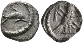 PHOENICIA. Tyre. Circa 393-358 BC. 1/24 Shekel (Silver, 8 mm, 0.49 g, 11 h). Dolphin swimming right. Rev. Owl standing right, head facing; crook and f...