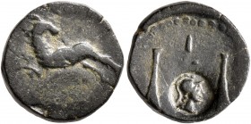 SYRIA, Uncertain. 3rd century AD. Hemiassarion (Bronze, 15 mm, 3.12 g, 1 h). Ram leaping left, head right. Rev. Scales; pellet in central field; below...