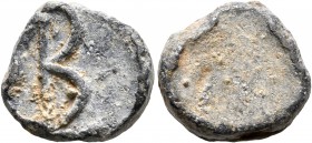 The imperial sakelle or the vestiarion (?), 8th century. Seal (Lead, 14 mm, 5.08 g). Large B (for "basilikos"?). Rev. Blank or obliterated. An unusual...