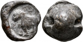 SEALS, Roman. 1st-3rd centuries. Seal (Lead, 15 mm, 5.13 g). Lion seated to left, raising forepaw. Very fine.