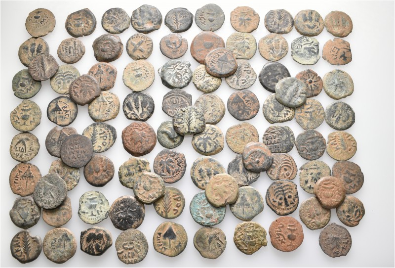 A lot containing 90 bronze coins. All: Judaea. Fine to about very fine. LOT SOLD...