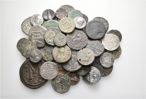 A lot containing 10 silver and 40 bronze coins. Includes: Roman Provincial, Byzantine, Islamic and early Medieval coins. Fine to very fine. LOT SOLD A...