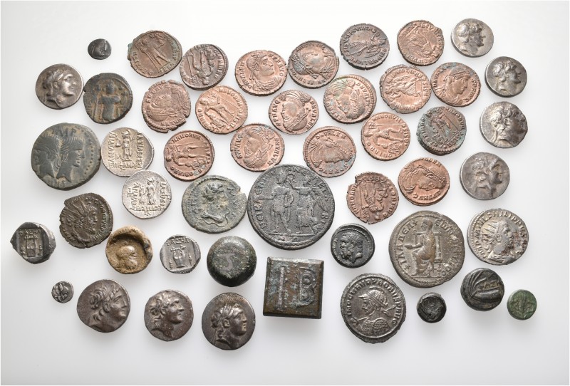 A lot containing 15 silver, 30 bronze coins, 2 bronze weights and 1 lead tessera...