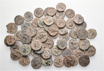 A lot containing 58 bronze coins. All: Roman Imperial. About very fine to very fine. LOT SOLD AS IS, NO RETURNS. 58 coins in lot.