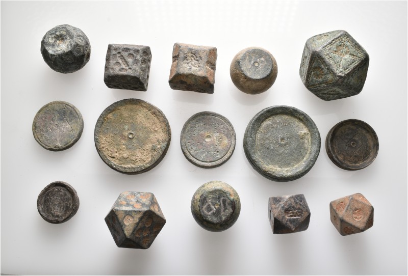 A lot containing 15 bronze weights. Includes: Byzantine and Islamic. Fine to abo...