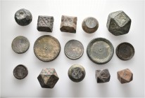 A lot containing 15 bronze weights. Includes: Byzantine and Islamic. Fine to about very fine. LOT SOLD AS IS, NO RETURNS. 15 items in lot.
