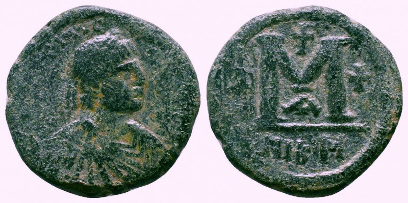 BYZANTINE.Justinian I.527-565 AD, AE Follis. 

Condition: Very Fine

Weight: 16....