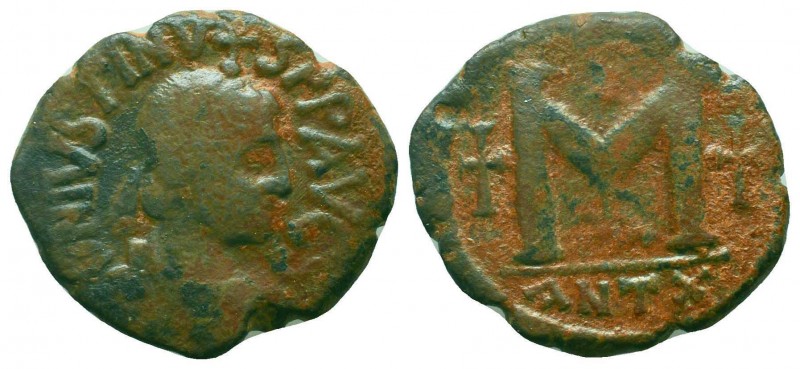 BYZANTINE.Justinian I.527-565 AD, AE Follis. 

Condition: Very Fine

Weight: 14....