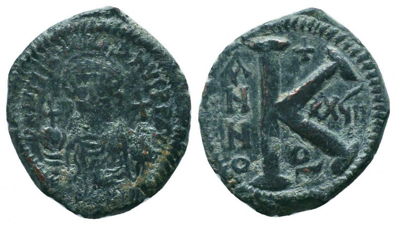 BYZANTINE.Justinian I.527-565 AD, AE Half Follis. 

Condition: Very Fine

Weight...