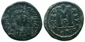 BYZANTINE.Justinian I.527-565 AD, AE Follis. 

Condition: Very Fine

Weight: 15.30 gr
Diameter: 32 mm