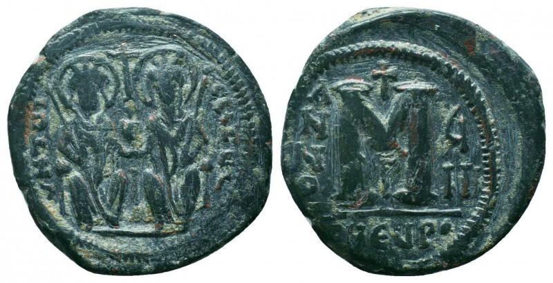 BYZANTINE.Justin II and Sophia. 565-578 AD, AE Follis. 

Condition: Very Fine

W...