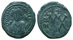 BYZANTINE.Maurice Tiberius, 582-602 AD. AE Half Follis,

Condition: Very Fine

Weight: 5.30 gr
Diameter: 24 mm