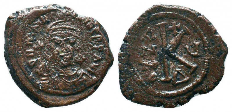 BYZANTINE.Maurice Tiberius, 582-602 AD. AE Half Follis,

Condition: Very Fine

W...