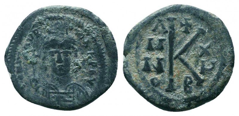 BYZANTINE. Maurice Tiberius, 582-602 AD. AE Half Follis,

Condition: Very Fine

...