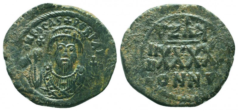 BYZANTINE.Phocas. 602-610 AD. AE Half follis, Constantinople mint.

Condition: V...