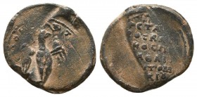 Byzantine lead seal of Stavrakios (?), imperial protospatharios (11th cent.)

Obv.: Eagle with open wings to right, circular invocative inscription, Κ...