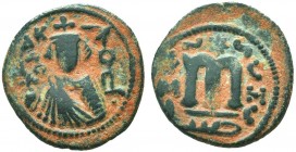 ARAB-BYZANTINE. Circa 685-705 AD. Æ Fals 

Condition: Very Fine

Weight: 3.80 gr
Diameter: 19 mm