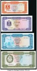 Libya Group Lot of 4 Examples About Uncirculated-Crisp Uncirculated. From the Brigadier General Donald D. McClanahan Collection of World Currency

HID...