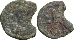 Phocas (602-610). AE Hald Follis, Ravenna mint. D/ Crowned, draped and cuirassed bust facing, holding globus cruciger. R/ Large K; cross above; to lef...