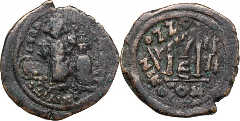 Dramatic overstriking.Heraclius (610-641). AE Follis, Constantinople mint. Overs...