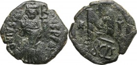 Heraclius (610-641). AE Follis of Justin I, Constantinople mint, countermarked by Heraclius (Sicily mint). D/ DN IVSI[ ]VS PP AV. Bust of Justin I rig...