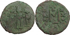 Heraclius (610-641). AE Follis, Ravenna mint. D/ Heraclius between Heraclius Contantine and Heraclonas, all standing facing, wearing crown and chlamys...