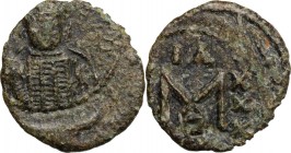 Constantine IV, Pogonatus (668-685). AE Follis, Ravenna mint. D/ Helmeted and cuirassed bust facing, holding spear and shield. R/ Large M between [A/N...
