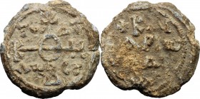 Lead Seal, 8th-12th century. D/ Cruciform invocative monogram: Θεότοκε βοήθει; in the quarters: τῷ δούλῳ σοῦ.
 n. R/ Inscription in four lines: KAI/C...