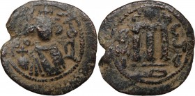 Arab-byzantine, Umayyad Caliphate. time of 'Abd al-Malik ibn Marwan (AH 65-86 / AD 685-705). AE Fals. Hims (Emesa) mint. Struck circa 685-690s. D/ Cro...