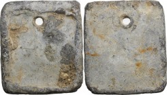 Leads from Ancient World. Greek Italy. Uncertain. PB rectangular plaquette, not yet punched or stamped; holed for suspension or attachment. D/ Framed,...
