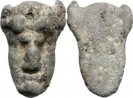 Leads from Ancient World. Greek Italy. Lead, grotesque mask, VI-IV century BC. PB. RR. mm. 39. g. 73.48.