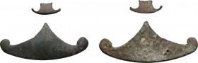 Varia romana. Two bronze decorations, pelta shaped, 3rd century AD. AE. g. 31,73, mm. 71; g. 1,17, mm. 23,5. The larger, with a lovely enamel-like oli...